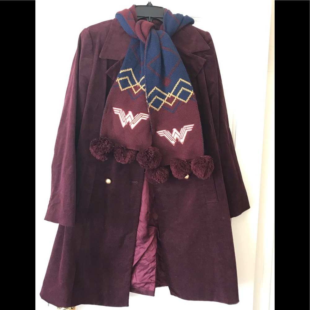 A DOUBLE BREASTED BURGUNDY COAT
